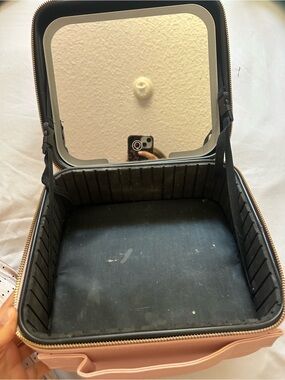 Pink makeup bag with light mirror
